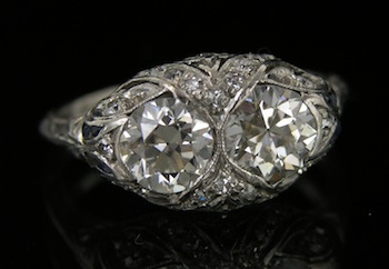 Appraisal: A Vintage Platinum Diamond Ring Dainty platinum mount with scroll