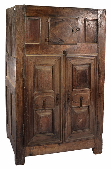 Appraisal: A TH CENTURY AND LATER OAK CUPBOARD of pegged panelled