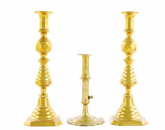 Appraisal: Queen Anne brass candlestick and pair brass push-up sticks petal