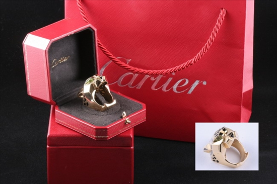 Appraisal: CARTIER PANTHER HEAD RING Fully sculpted K yellow gold panther