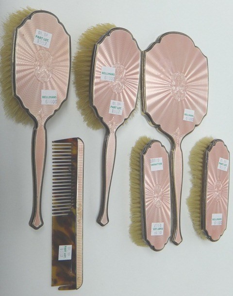 Appraisal: A lady's silver and pale pink enamel mounted six piece