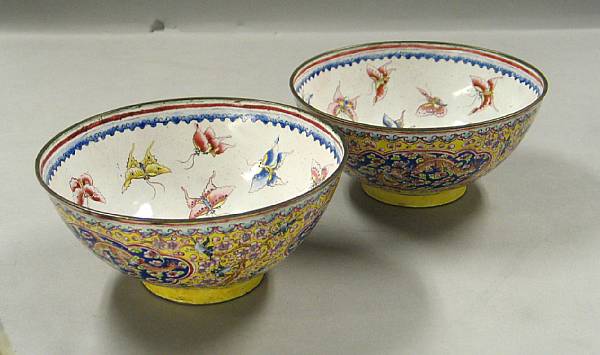 Appraisal: Two yellow and white ground enameled metal bowls Each interior