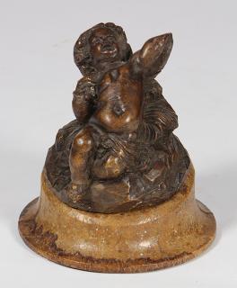 Appraisal: Continental ecclesiastical and architectural carved wood putto th Century unpainted