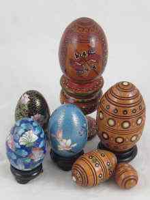 Appraisal: A set of three Russian nesting wooden Easter eggs together