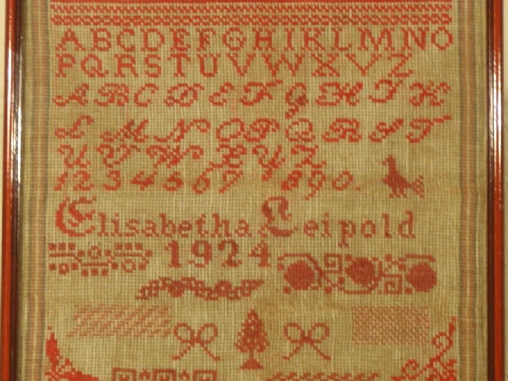 Appraisal: An early thC woolwork sampler by Elizabeth Leipold dated worked