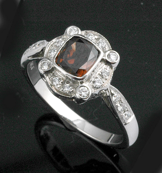 Appraisal: A COGNAC AND WHITE DIAMOND DRESS RING The collet set