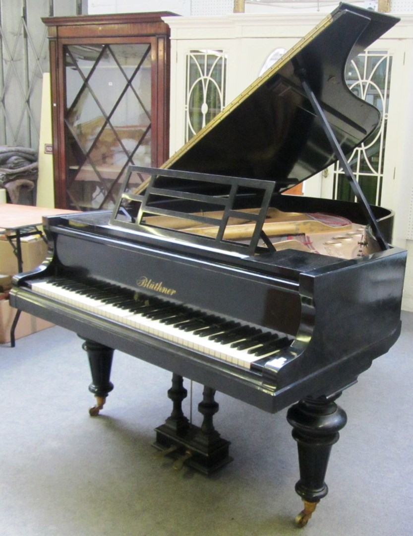 Appraisal: A Bluthner iron framed overstrung grand piano with ebonised case