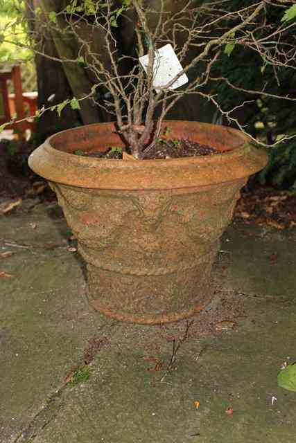 Appraisal: A WHICHFORD POTTERY TERRACOTTA PLANT POT with mask and fruiting