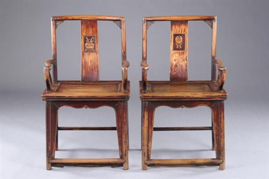 Appraisal: PAIR CHINESE LACQUERED ELMWOOD ARM CHAIRS Ming Dynasty Shanxi province