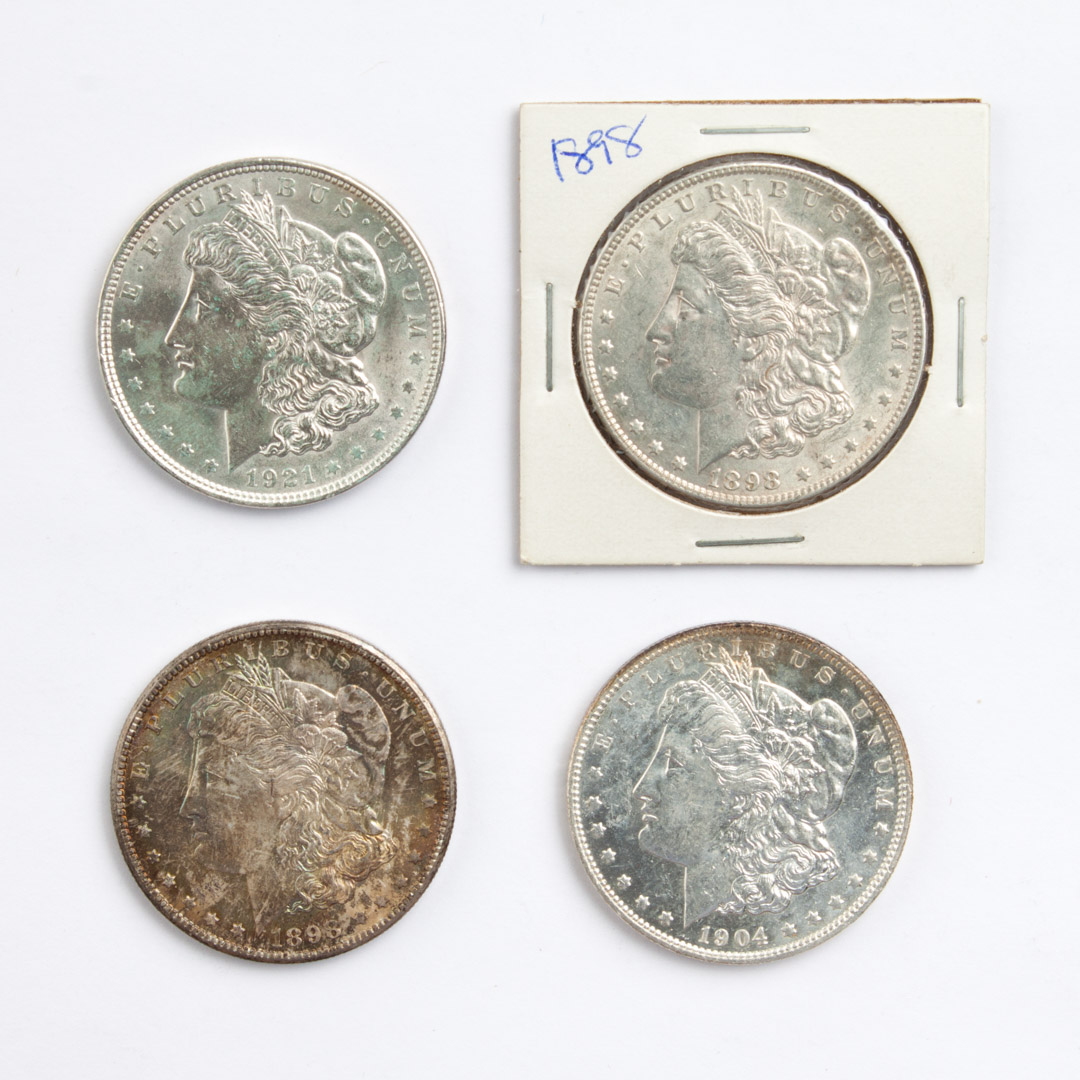 Appraisal: Four U S Morgan type silver dollars - comprising MS-