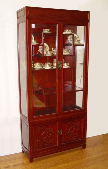 Appraisal: CHINESE ROSEWOOD GLASS FRONT DISPLAY CABINET Double glass upper doors