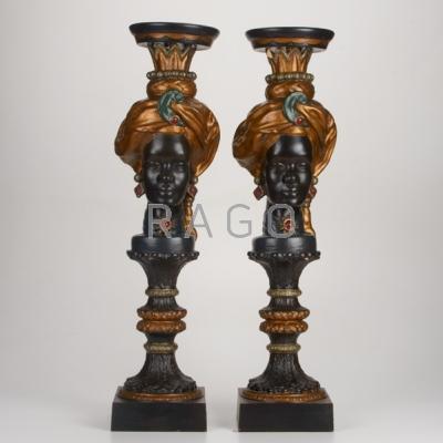 Appraisal: BLACKAMOOR CANDLESTANDS Pair mid th c Composite material Unmarked x