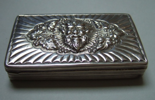 Appraisal: A Dutch rectangular hinge lidded box the cover embossed with