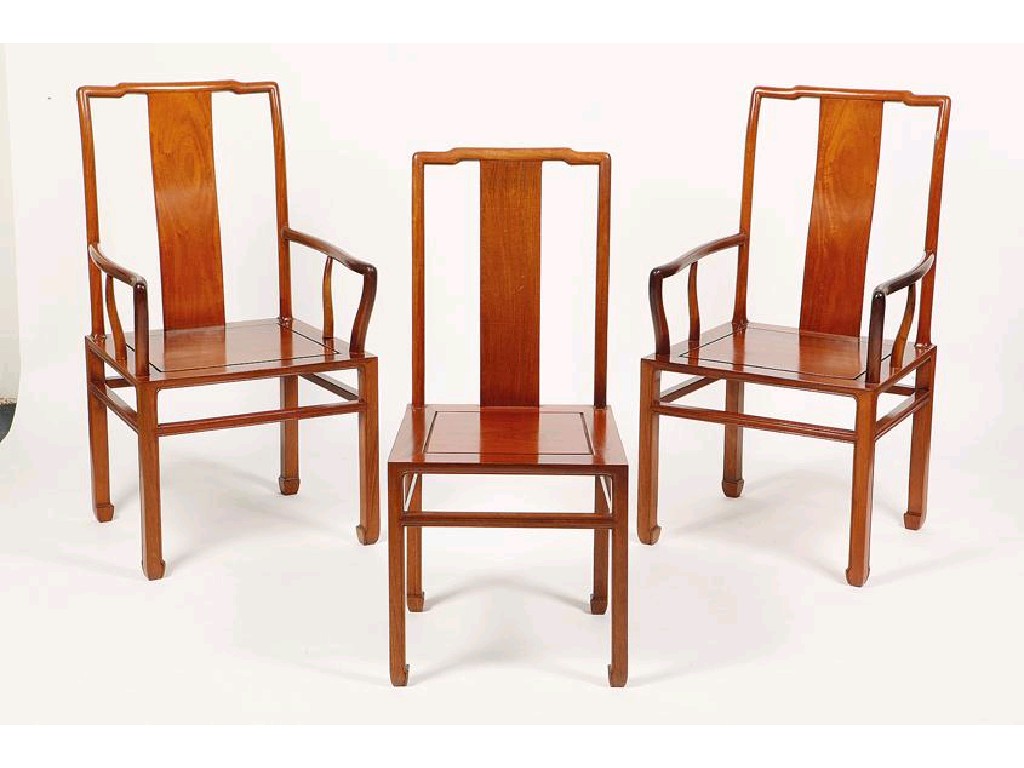 Appraisal: A SET OF EIGHT CHINESE HUALI CHAIRS the shaped cresting