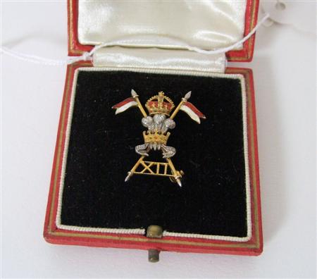 Appraisal: Gold enamel regimental brooch for the th Hussars regiment in