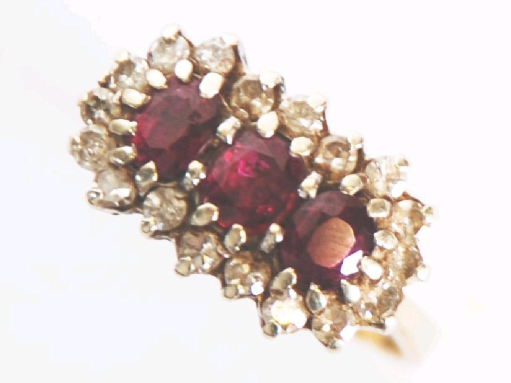 Appraisal: ct GOLD RUBY AND DIAMOND TRIPLE CLUSTER RING set with