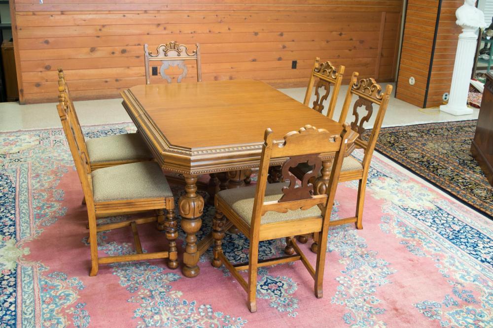 Appraisal: WALNUT DINING TABLE SIX CHAIRS AND THREE LEAVES SET English