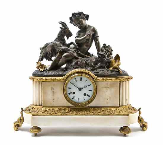 Appraisal: A Continental Bronze and Marble Mantel Clock depicting a young