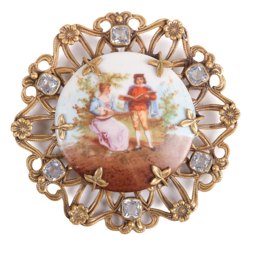 Appraisal: JOSEFF OF HOLLYWOOD OPENWORK MEDALLION BROOCH FEATURING A PORCELAIN ROMANTIC