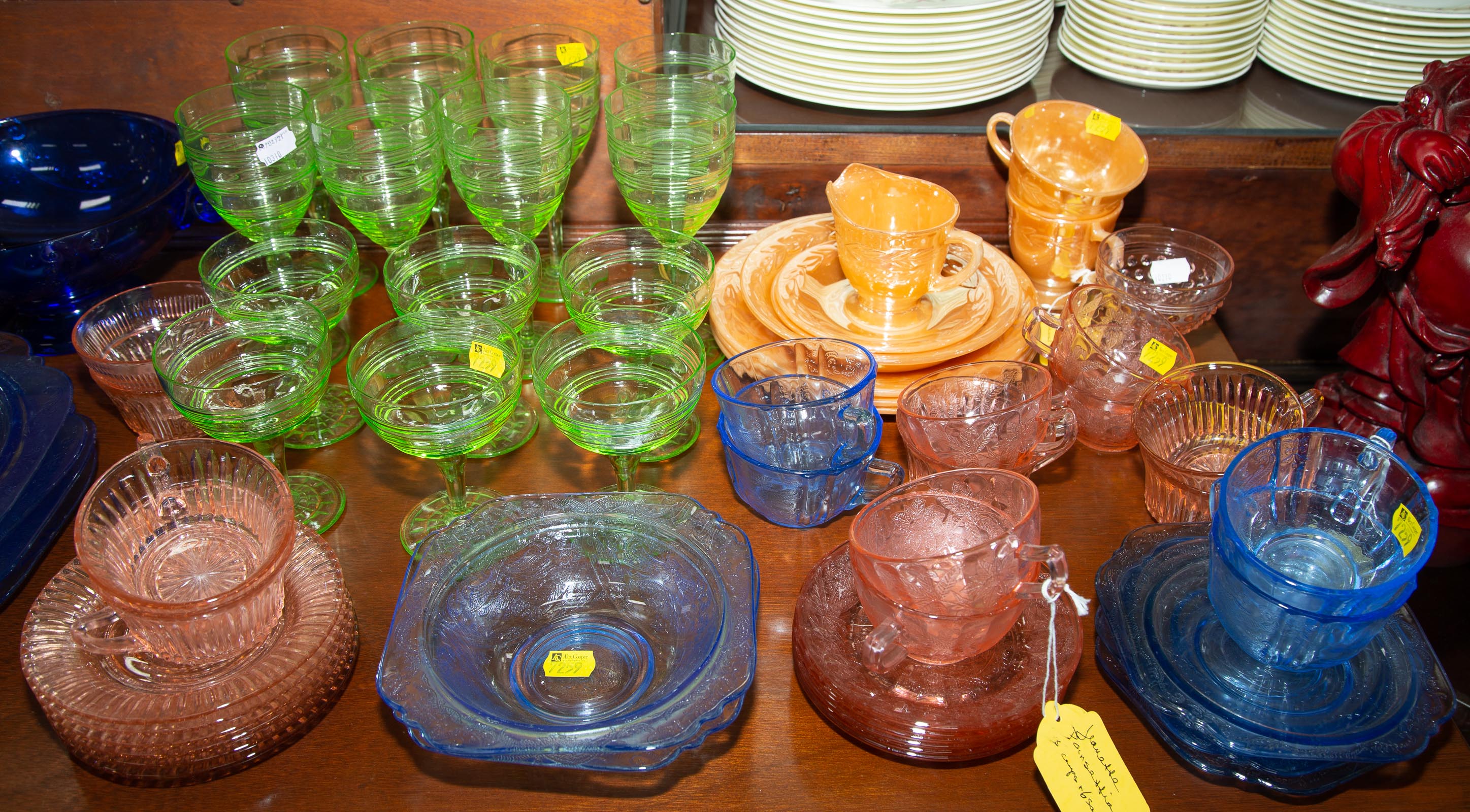 Appraisal: A LARGE SELECTION OF GLASSWARE Includes glass plates cups saucers