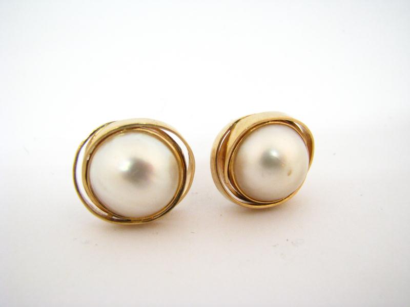 Appraisal: Lady's K YG Mabe Pearl Clip Earrings pearls have scratches