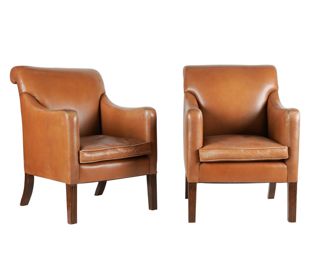 Appraisal: PAIR OF ROSE TARLOW LEATHER ARMCHAIRSunsigned each set on casters