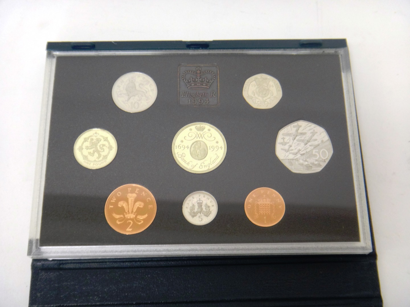 Appraisal: Sixteen United Kingdom year type specimen proof coin sets from