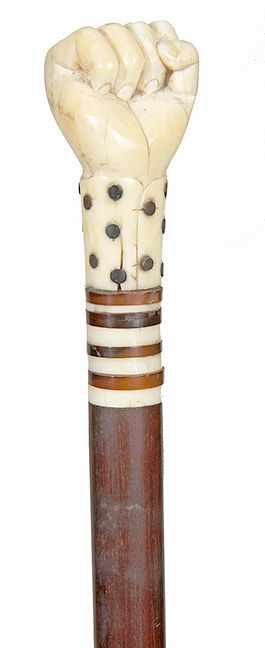 Appraisal: A Clinched Fist Nautical Cane- Mid th Century- A whale