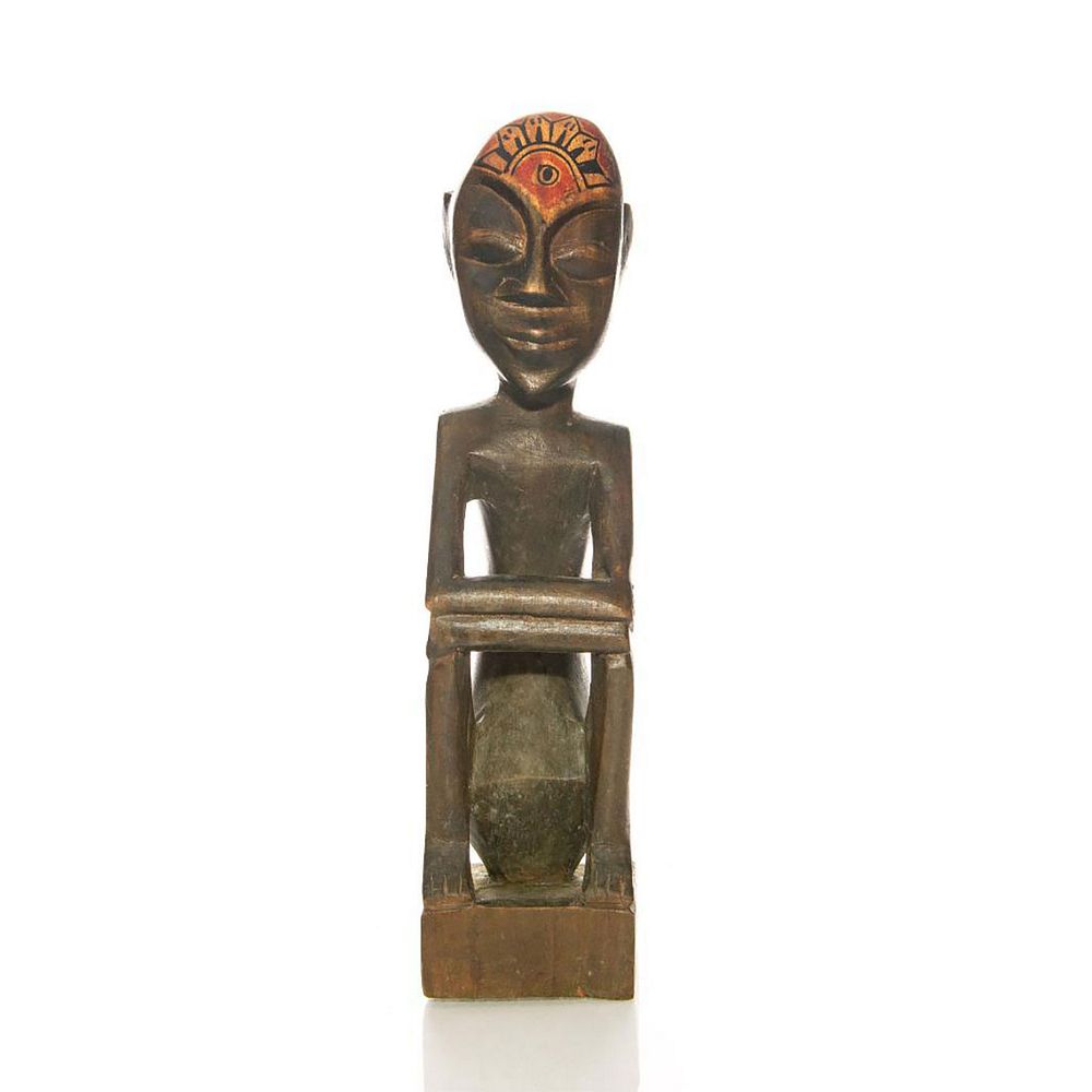 Appraisal: TRIBAL TRADITIONAL AFRICAN WOOD SCULPTURE Hand decorated wood statue Issued