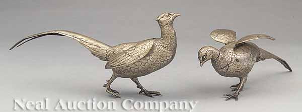 Appraisal: A Pair of Continental Silvered Metal Pheasants each with movable