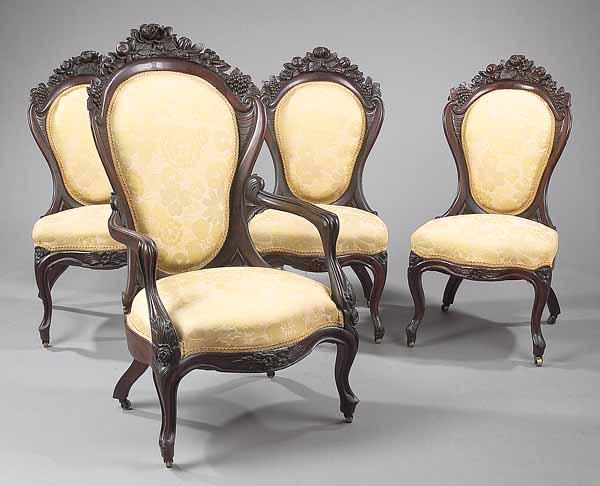 Appraisal: A Suite of Four American Rococo Laminated Rosewood Parlor Chairs