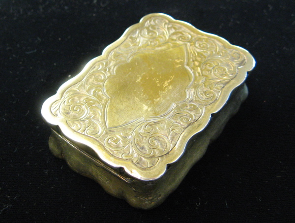 Appraisal: AN ENGLISH VICTORIAN STERLING SILVER PILL BOX with gold plating