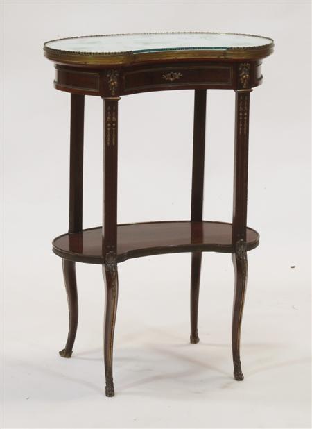 Appraisal: A mahogany and ormolu kidney shaped side table the pierced