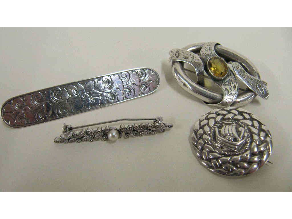 Appraisal: Lot comprising Celtic silver shield brooch engraved silver bar brooch