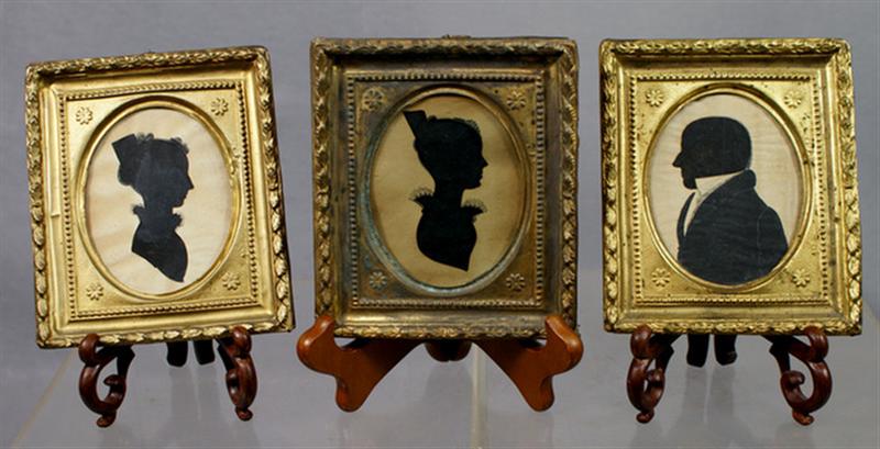 Appraisal: oval cut out paper silhouettes matching gilt frames women and