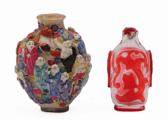 Appraisal: A Chinese porcelain snuff bottle th Centuryhaving relief moulded Hundred