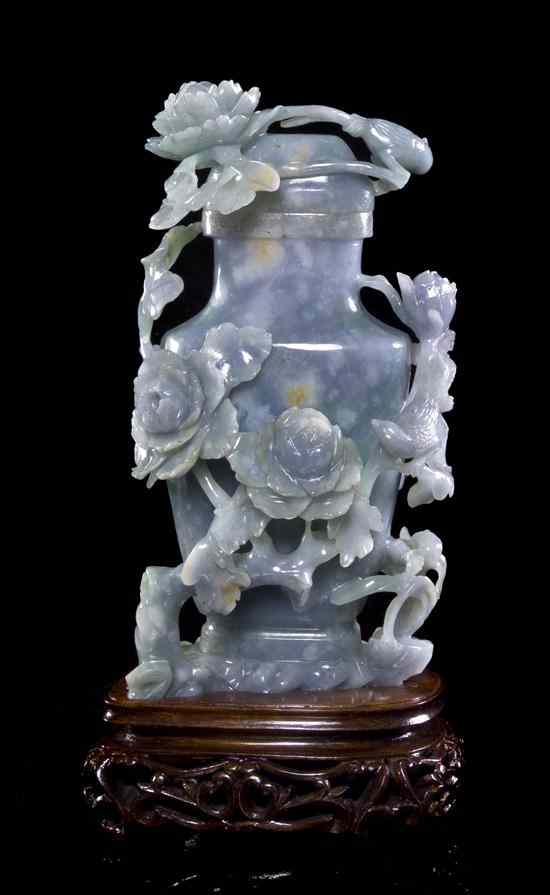 Appraisal: A Chinese Hardstone Vase of lavender white and russet colored