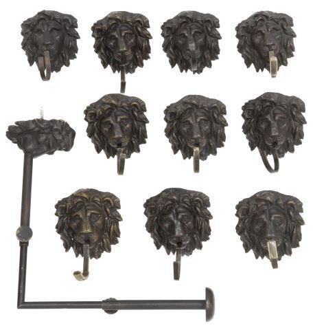 Appraisal: lot of Bronze lion head display hooks with associated hardware