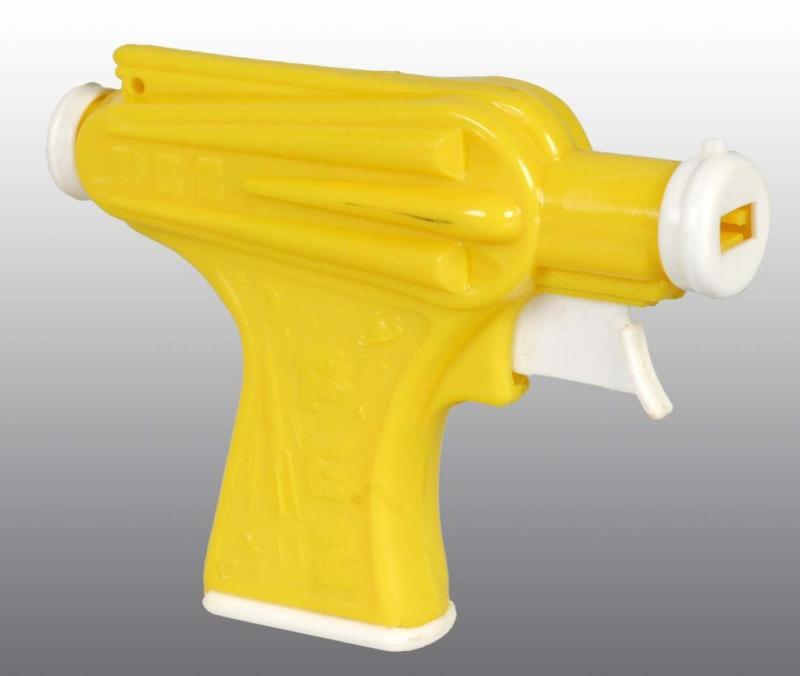 Appraisal: Pez Space Gun Shooter Description Circa s Yellow in color