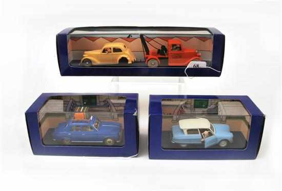 Appraisal: THREE EN VOITURE TINTIN FIGURES FROM TINTIN COMICS INCLUDING REF