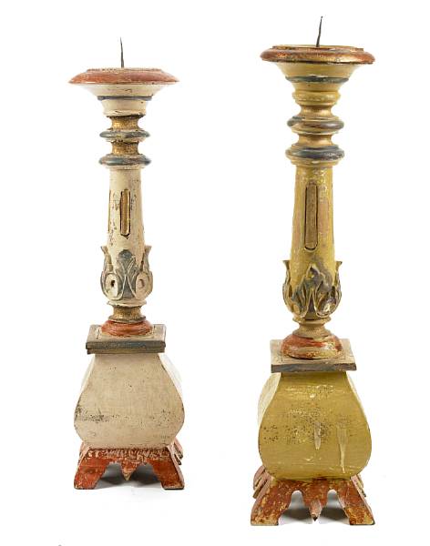 Appraisal: A pair of Neoclassical style paint decorated carved wood candle