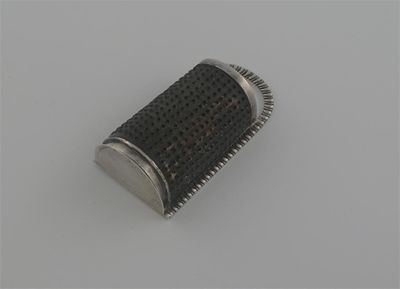 Appraisal: A George III kitchen nutmeg grater with gadrooned border and