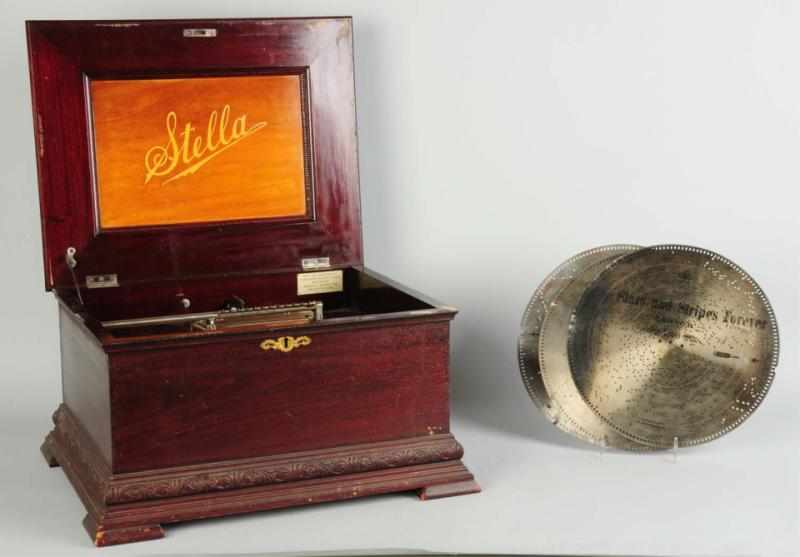 Appraisal: Stella Double Comb Disc Music Box Working Includes discs Condition