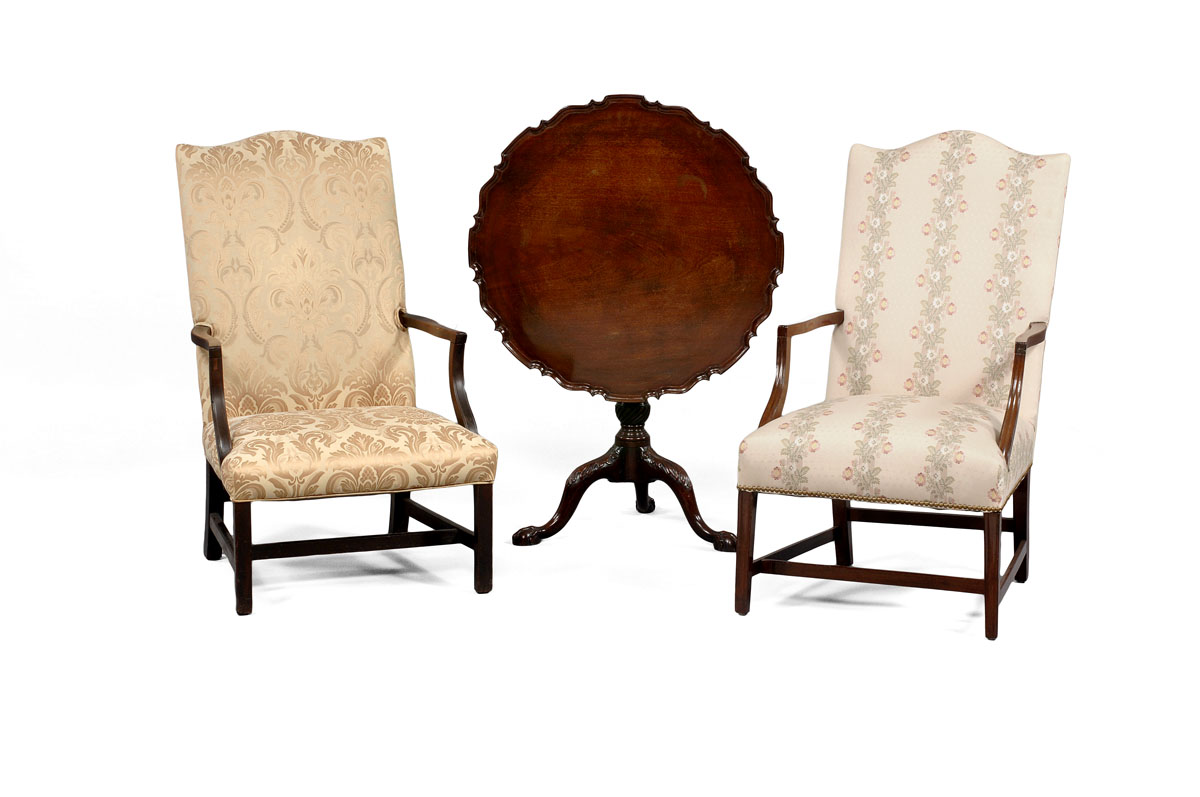 Appraisal: AMERICAN FEDERAL MAHOGANY LOLLING CHAIR The upholstered canted back with