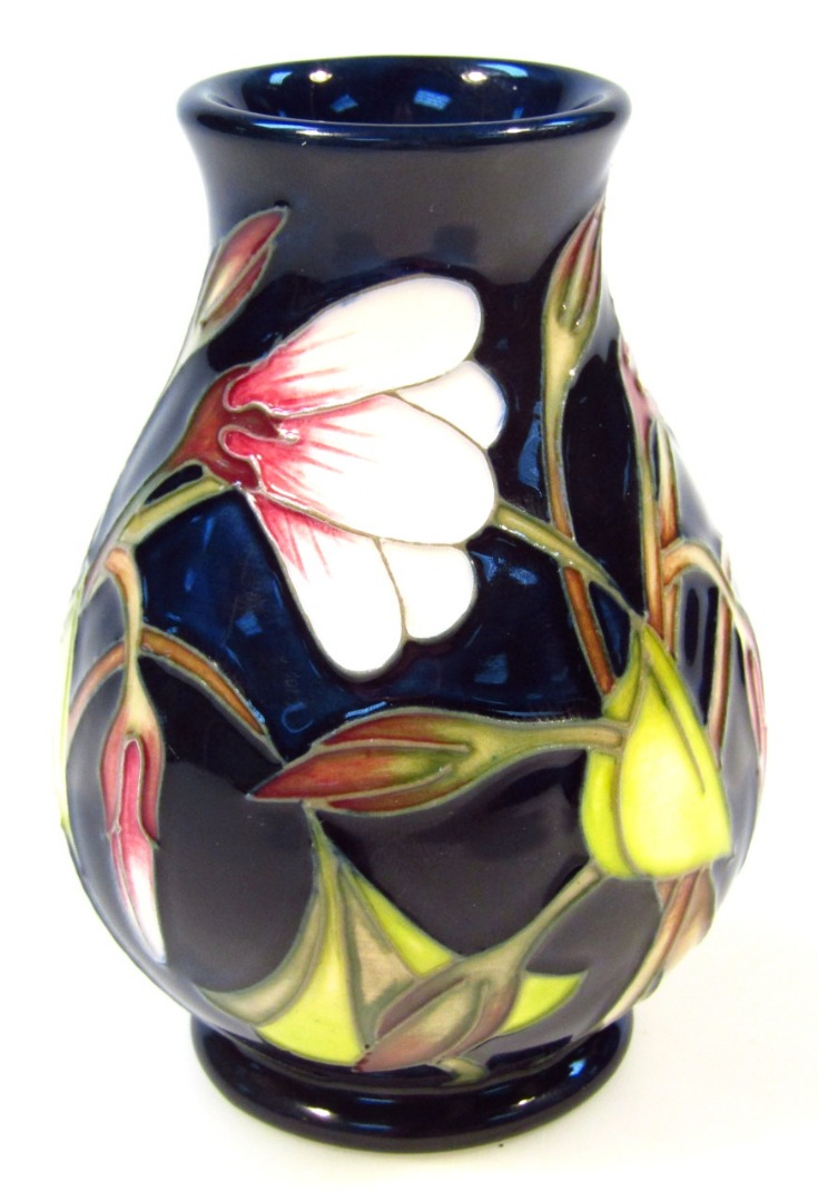 Appraisal: A Moorcroft pottery Wood Sorrel pattern vase of bellied circular