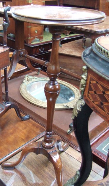 Appraisal: A late th century mahogany torchere the dished circular top