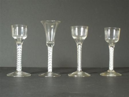 Appraisal: Three mid th century cordial glasses each with ogee bowl