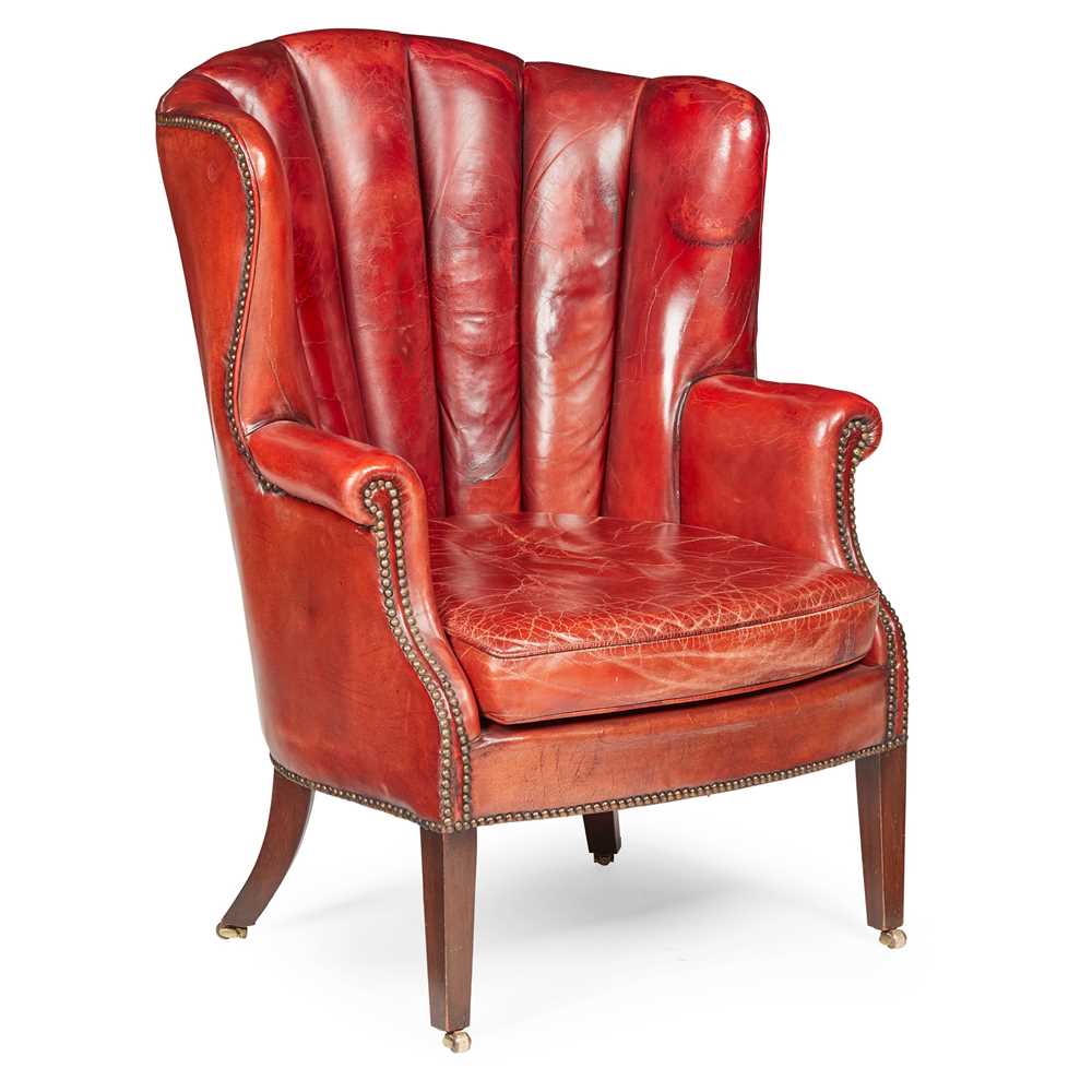 Appraisal: GEORGIAN STYLE CHANNEL-BACK RED LEATHER WING ARMCHAIR EARLY TH CENTURY