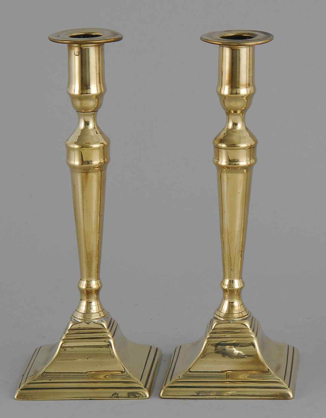 Appraisal: PAIR OF FEDERAL BRASS CANDLESTICKSLate th CenturyLarge bobeches over tapered