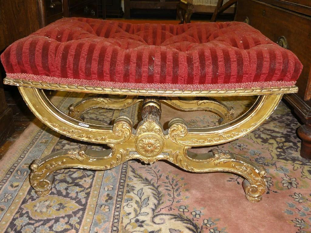 Appraisal: A th century gilded 'x' framed stool with scrolling acanthus